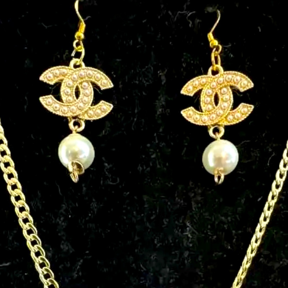 Matching Chanel and pearl dangle earrings to match the necklace